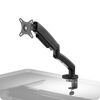 Ergonomische Monitorhalterung DESKSPACE MONITORARM in Schwarz mit Gasdruckfeder und VESA-Halterung, Hero-Aufnahme freigestellt vor dunklem Hintergrund